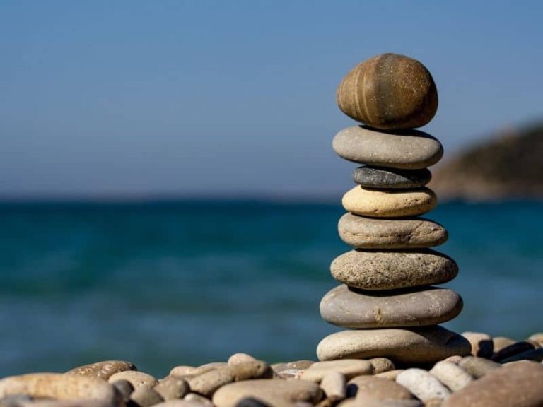 Rocks by the sea, creating a serene, relaxing scene