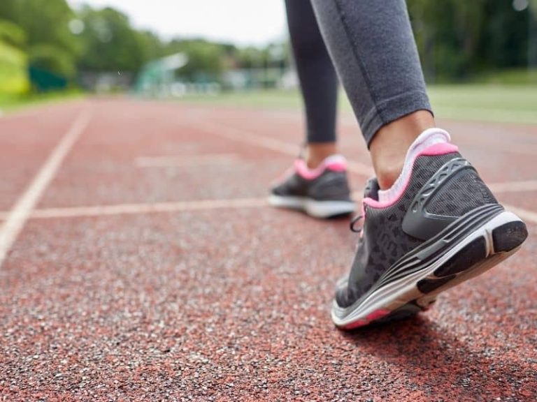 A girl's feet, running at the track