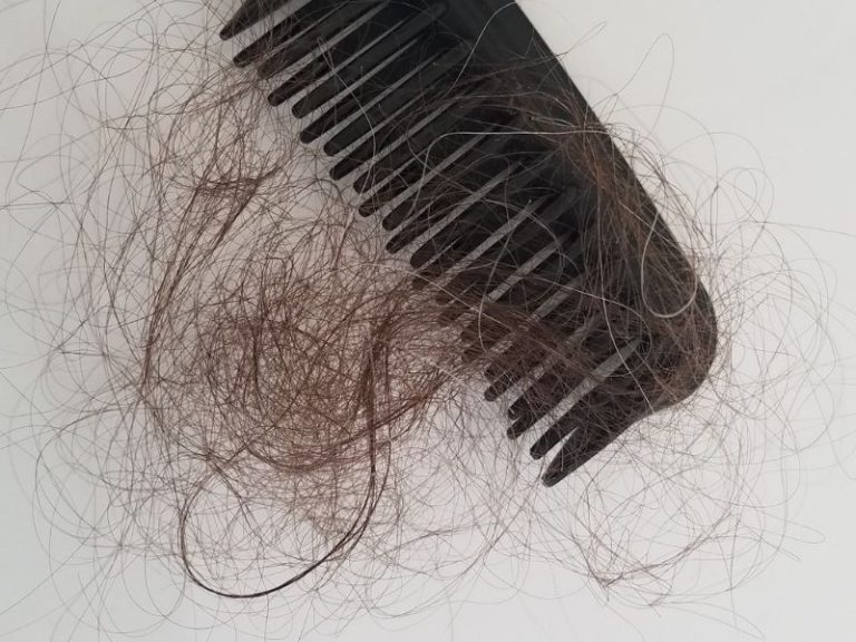 A clump of hair and a comb